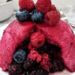 A close up of summer pudding with fresh fruit