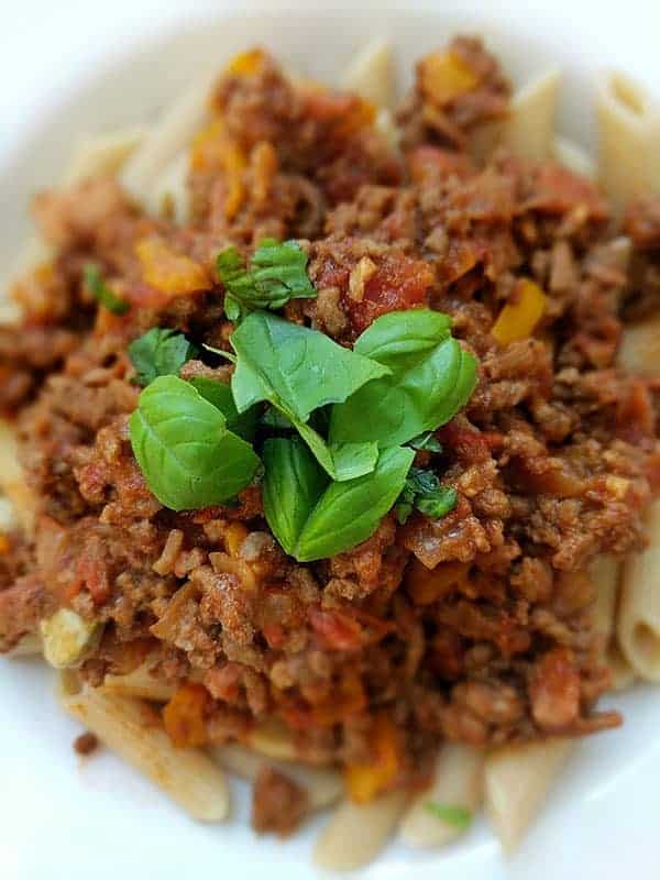A close up picture of pasta bolognese