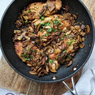 A skillet of Chicken Marsala