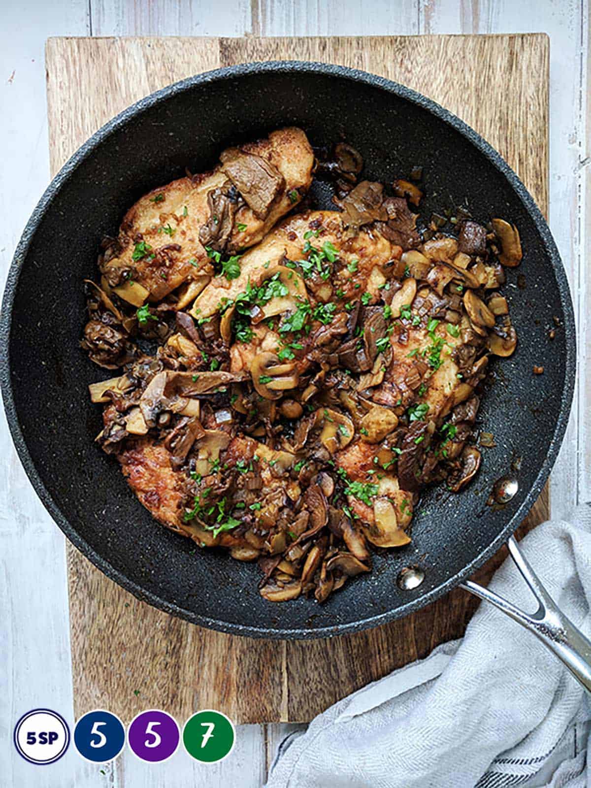 A skillet of chicken marsala with smartpoint values