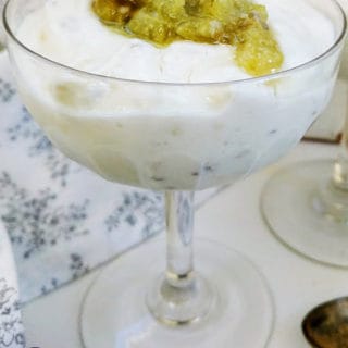 A glass bowl of gooseberry fool