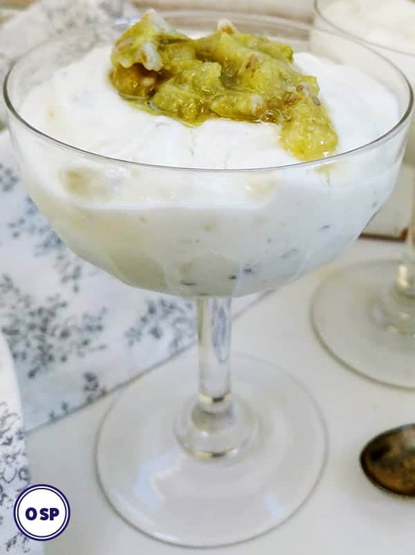 A glass bowl of gooseberry fool