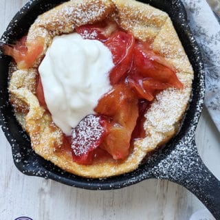 A dutch baby pancake in a skillet