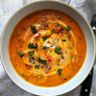 A colourful bowl of carrot & coriander soup