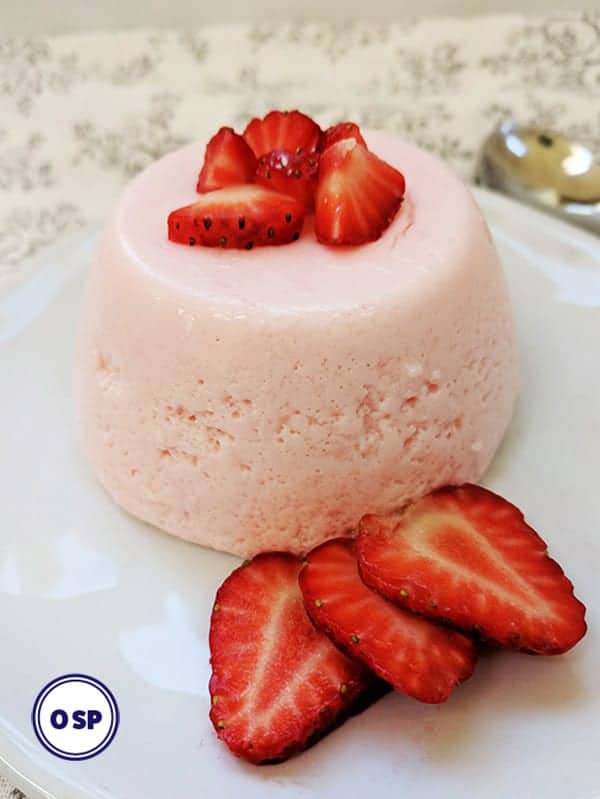 A white plate with strawberry fluff