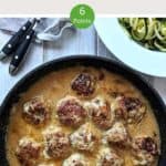 Swedish Meatballs in a skillet with a dish of courgette zoodles