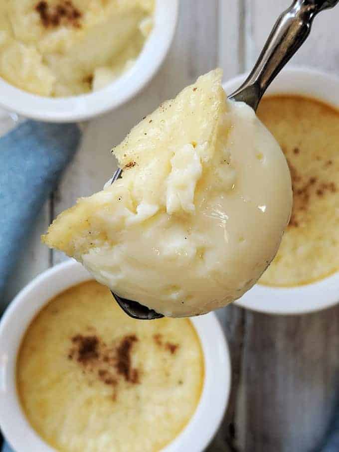 A close up of baked egg custard on a spoon