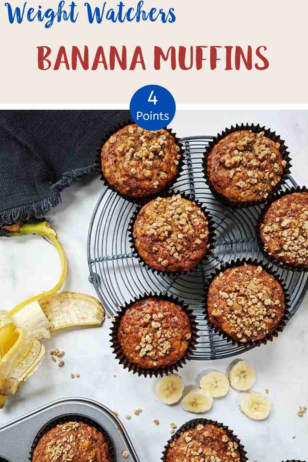 Banana Muffins on a wire rack with a peeled banana along side