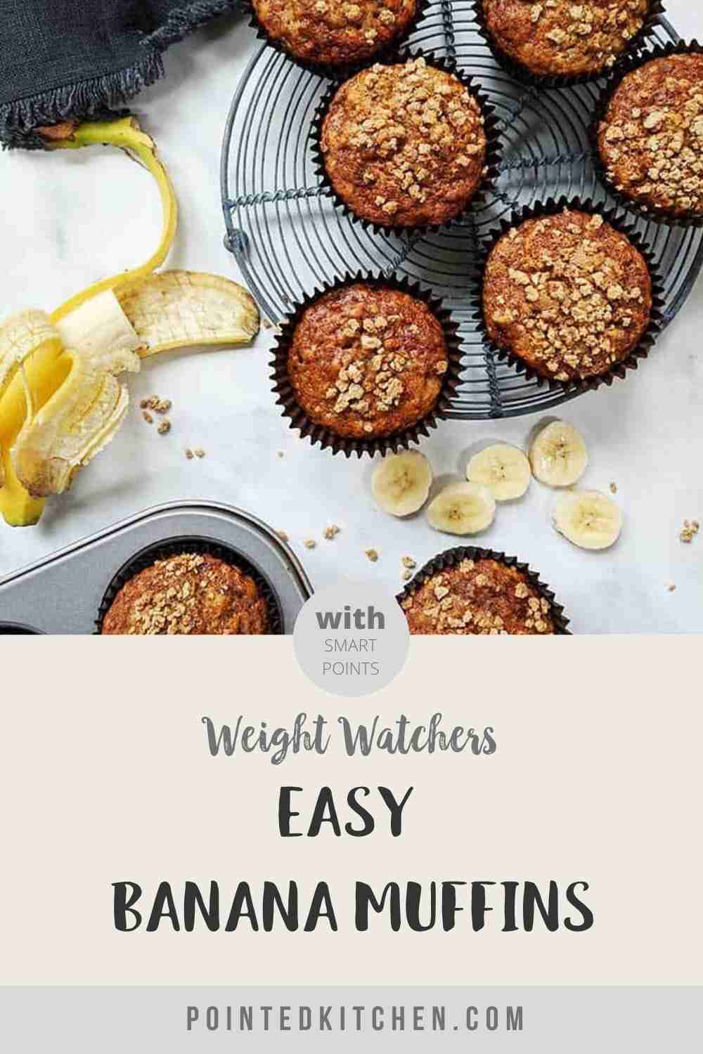 Banana Muffins on a wire rack with a peeled banana along side