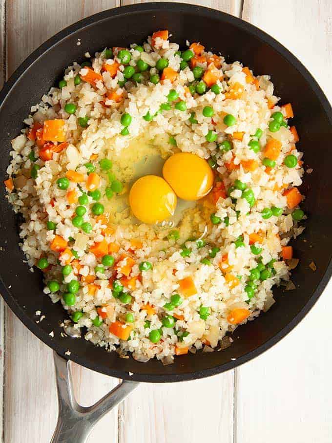 A skillet of egg fried cauliflower rice