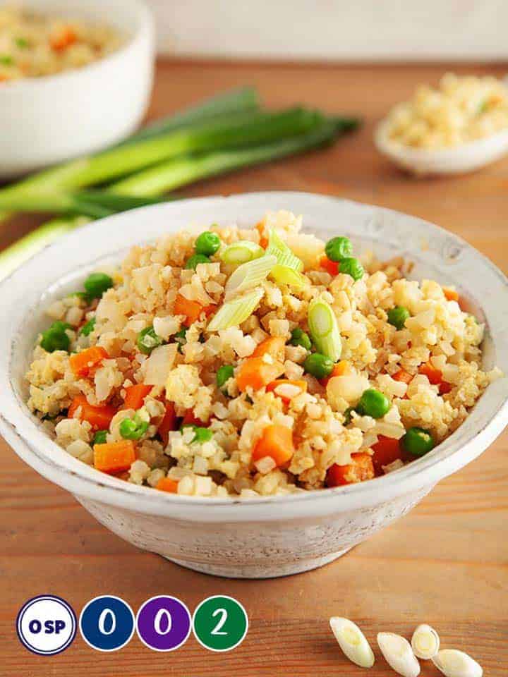 A dish of cauliflower egg fried rice. 