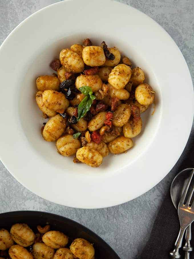 A white bowl of Gnocchi Pesto - weight watchers recipe