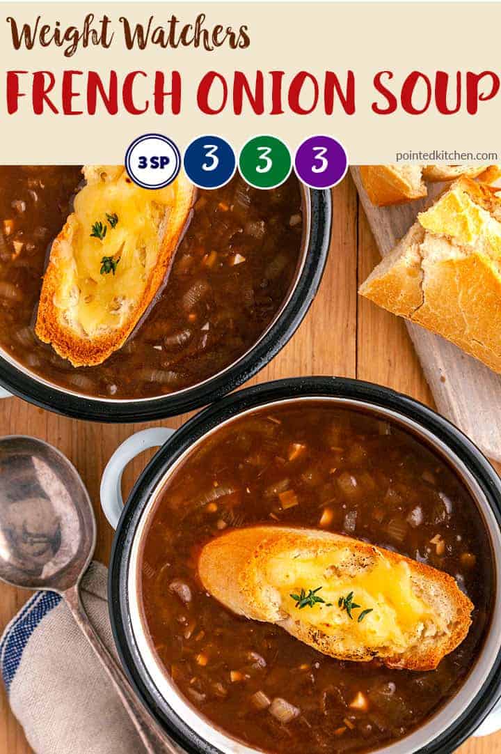 Two bowls of soup with croutons and french bread