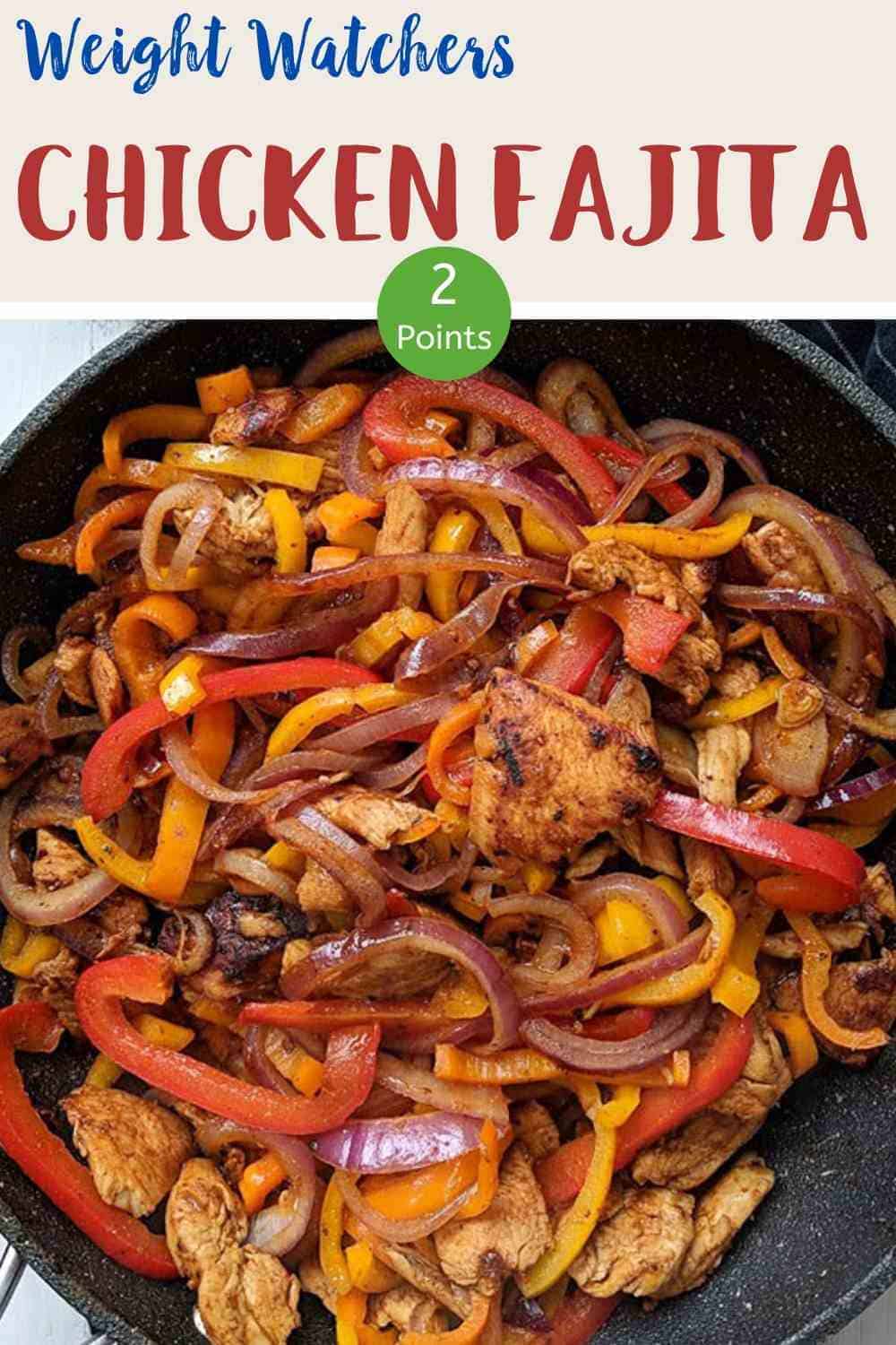 Chicken fajitas in a dark skillet