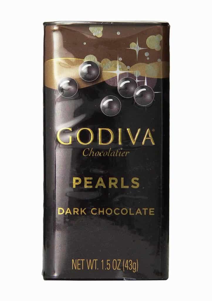 A tin of Godiva Dark Chocolate Pearls