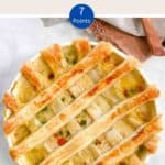 A white dish of Chicken Pot Pie with lattice pastry & a text overlay stating Weight Watchers Chicken Pot Pie