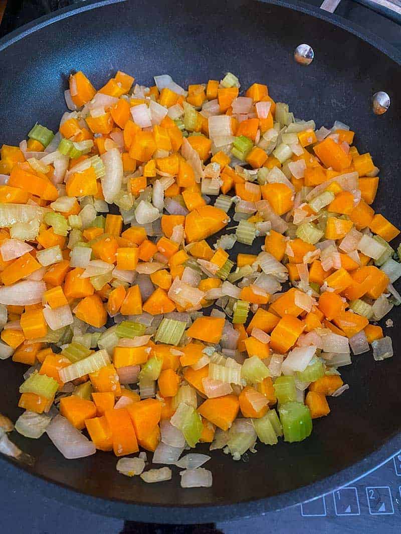 chopped carrot, celery onion and garlic in a skillet