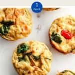 A picture of egg muffins on a white table with a text overlay stating WW Breakfast Egg muffin 1 point.