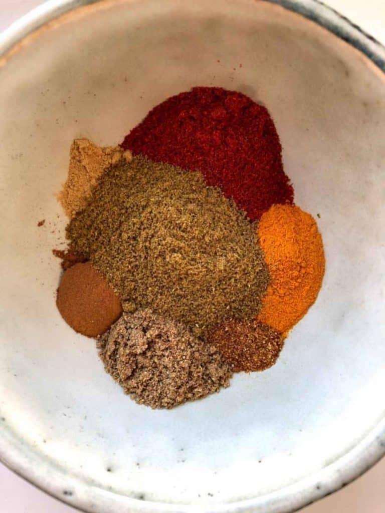 A white bowl of spices.