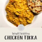 A white ceramic dish full of curry and a naan bread with text overlay stating Weight Watchers chicken tikka masala.