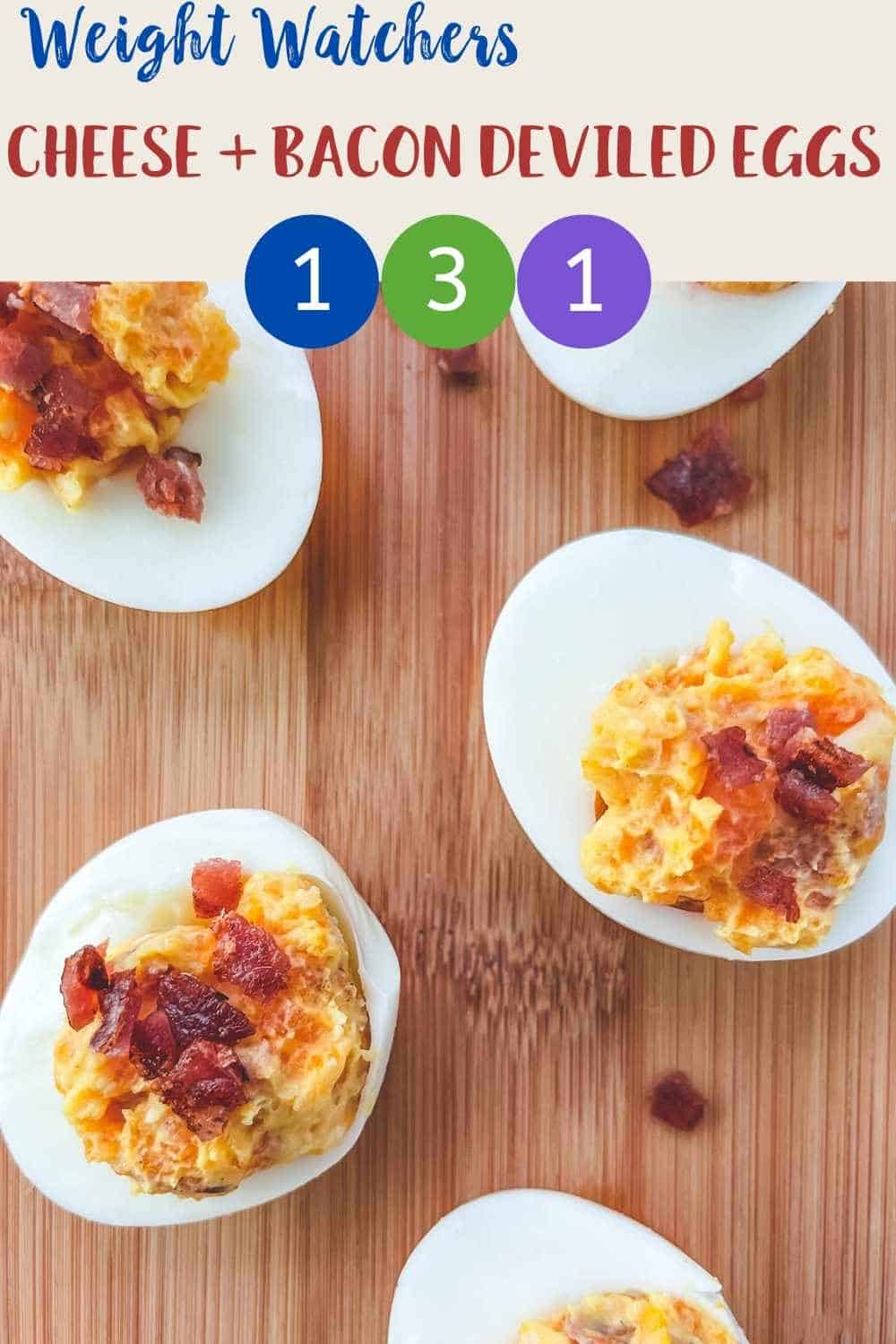 5 cheese and bacon stuffed eggs on a wooden board.