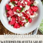 A white dish full of salad with text overlay stating Weight Watchers Watermelon and feta salad.