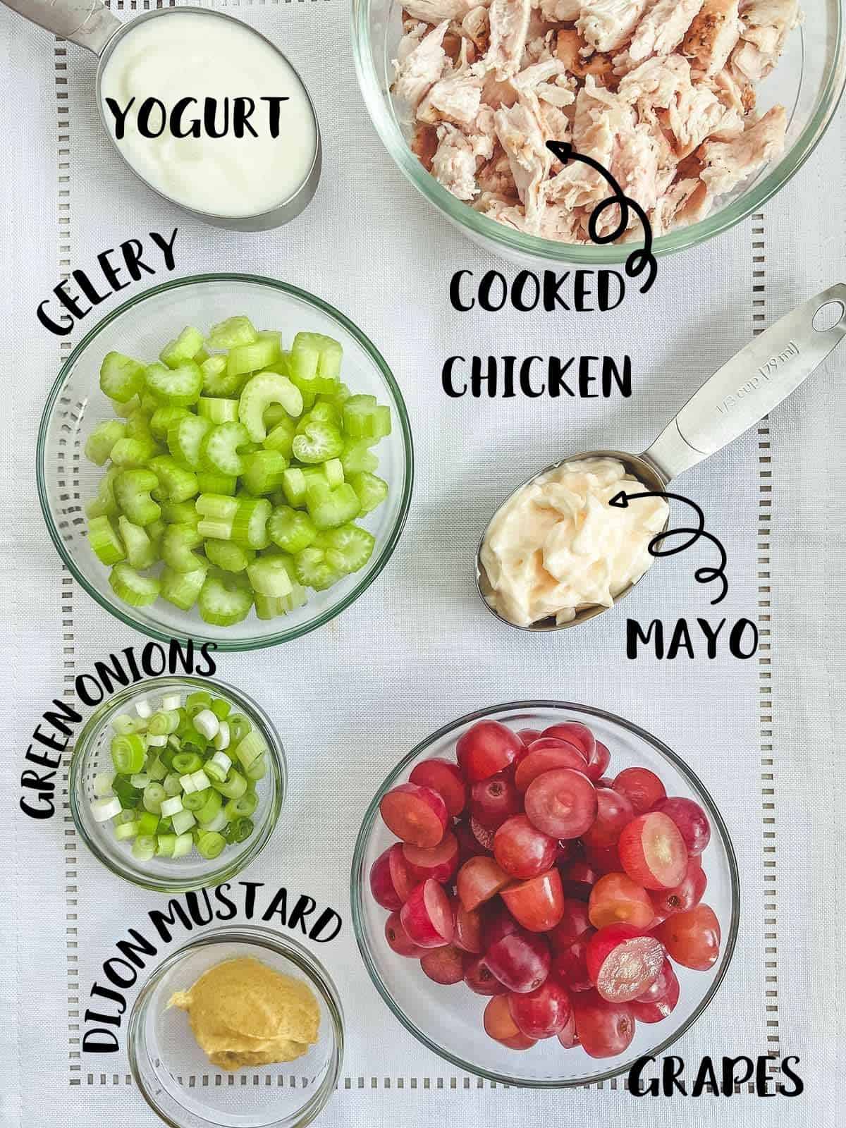 Ingredients laid out on a table to make Chicken Salad.