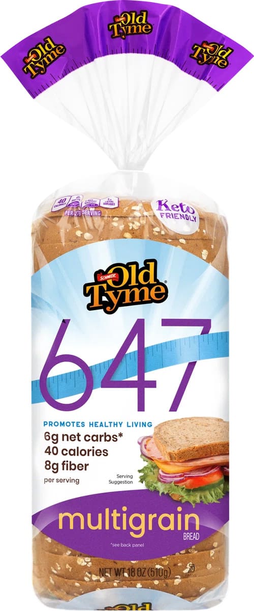 A loaf of Old Tyme 647 Multigrain bread in blue and purple packaging.