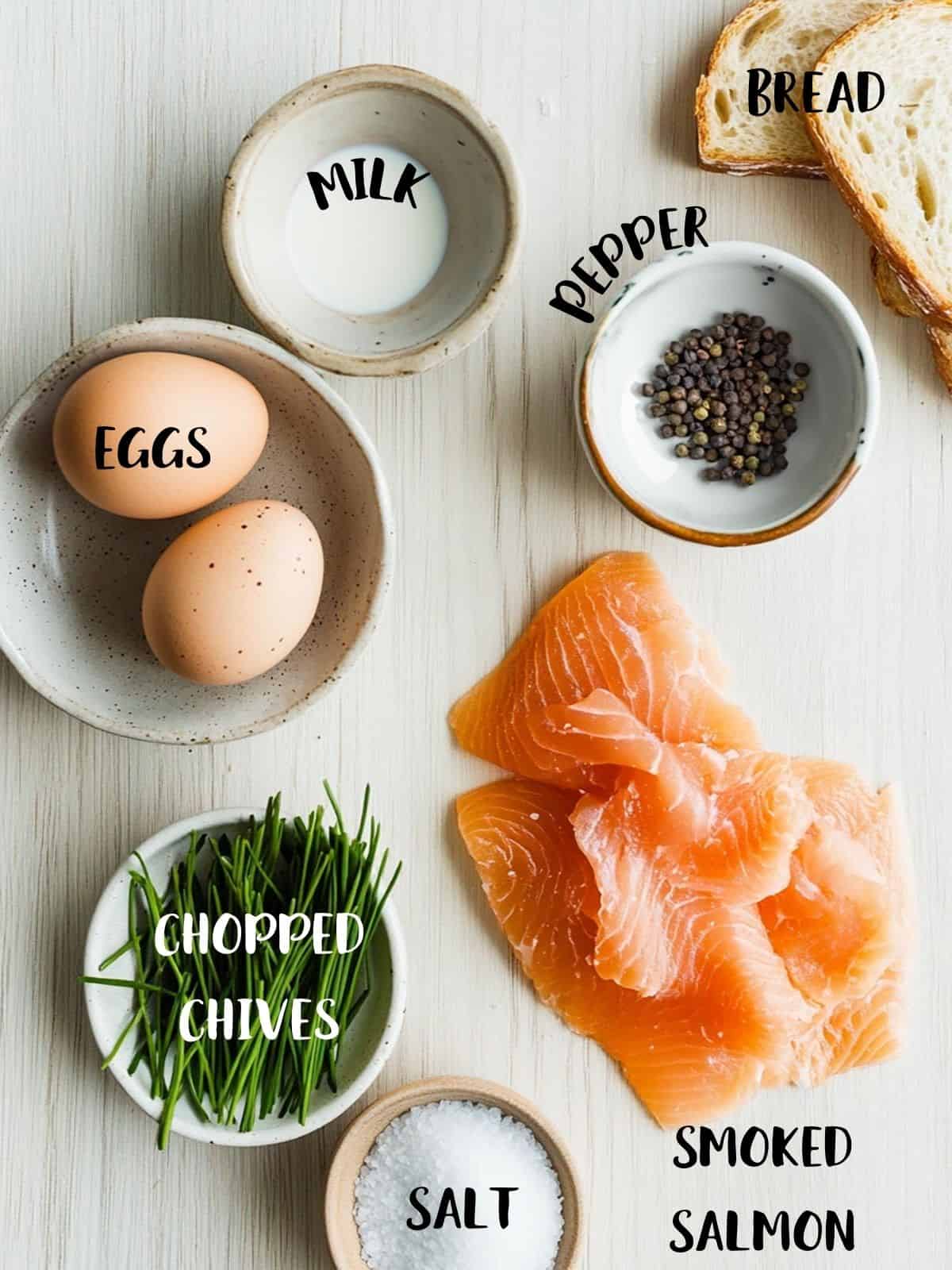 An image showing the ingredients used to make scrambled eggs on toast with smoked salmon.